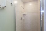 The guest bathroom features a full shower